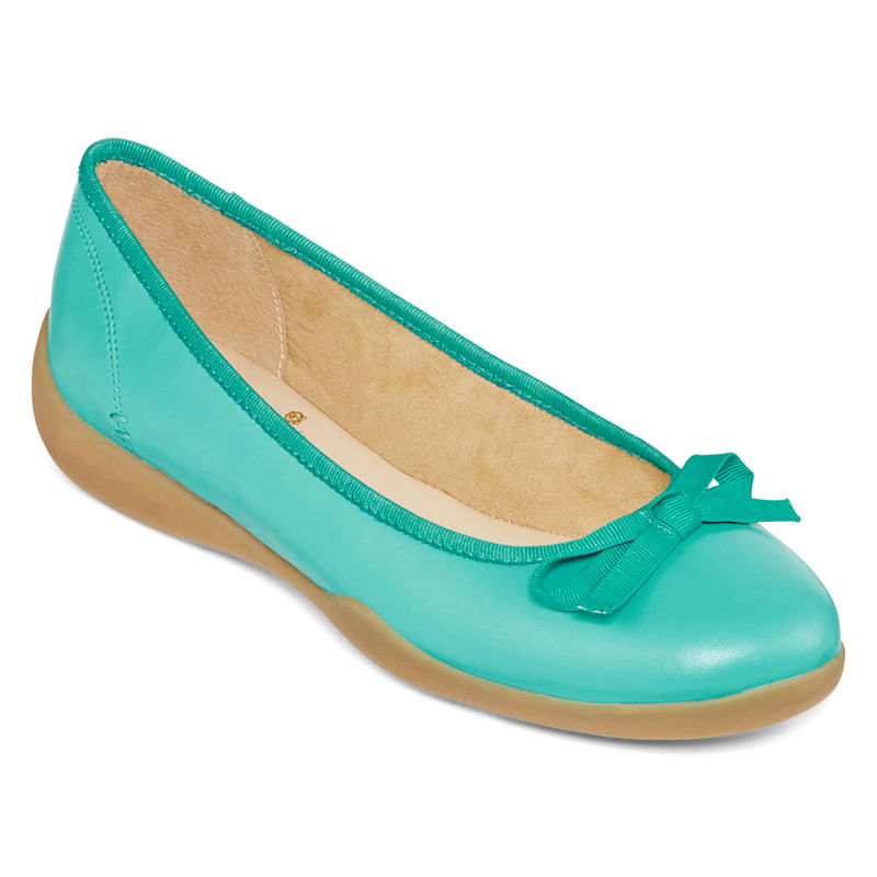 black flats with turquoise bottom